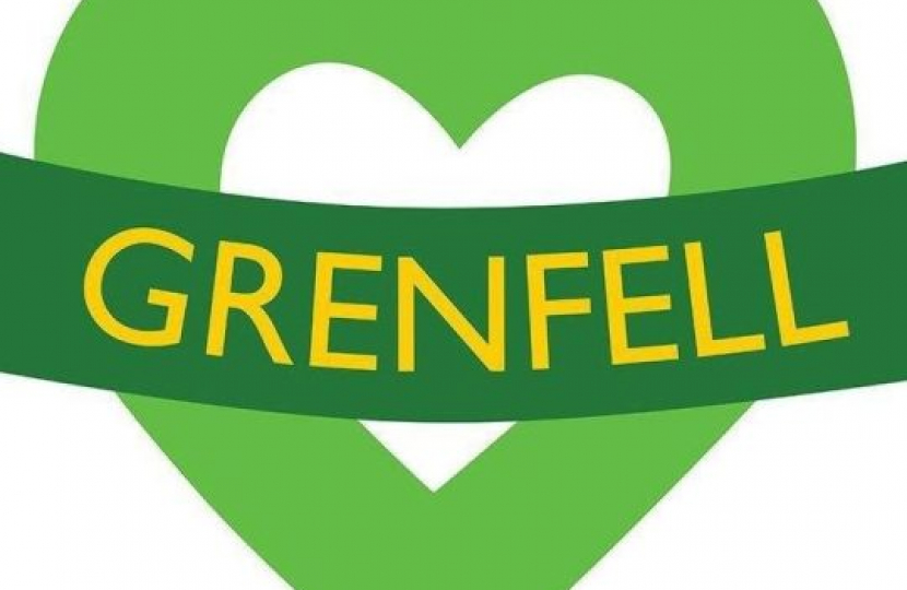 Image shows a green heart with a green banner across it, in yellow writing it reads GrenFell